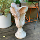 Image for article titled My One Passion in Life is Getting Beautiful Things For Free, Like This Parrot (??) Funeral Urn (??)